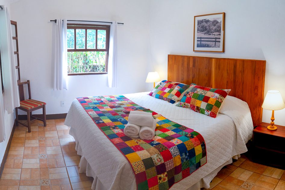 Cama de casal do Chalé 18
